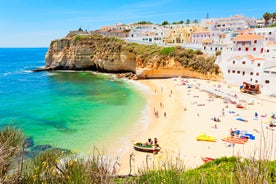 photo of an aerial view of wide sandy beach in touristic resorts of Quarteira and Vilamoura, Algarve, Portugal.