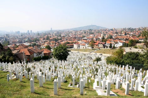 Photo of aerial view of Sarajevo from Yellow Fortress on a sunny day, Bosnia and Herzegovina.