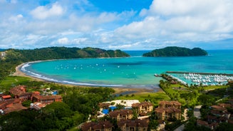 Photo of an aerial view of a mediterranean spanish beach (San Cristobal beach) at Almunecar, Granada, Spain.