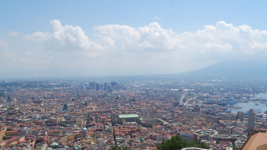 A breathtaking panoramic view of Naples, with Mount Vesuvius in the background.jpg