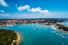 Photo of aerial view of beautiful town of Medulin waterfront view, Istria region of Croatia.