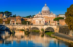 Aerial panoramic cityscape of Rome, Italy, Europe. Roma is the capital of Italy. Cityscape of Rome in summer. Rome roofs view with ancient architecture in Italy. 