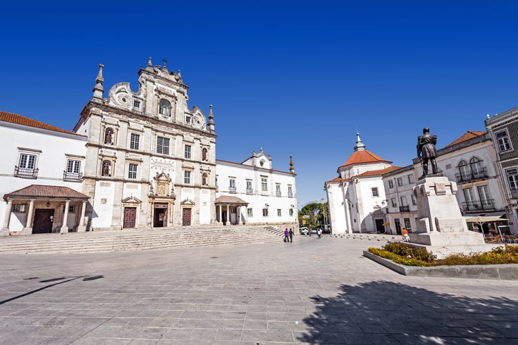 Photo of Sa da Bandeira Square with a view of the Santarem See Cathedral aka Nossa Senhora da Conceicao Church, built in the 17th century Mannerist style, Portugal.