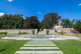 Photo of Lednice Chateau with beautiful gardens and parks on a sunny summer day, Czech Republic.