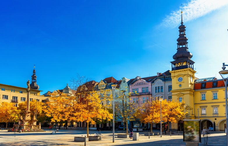 View of Masaryk Square, central square of Ostrava city overlooking Old Town Hall and Marian column on sunny autumn day, Czech Republic