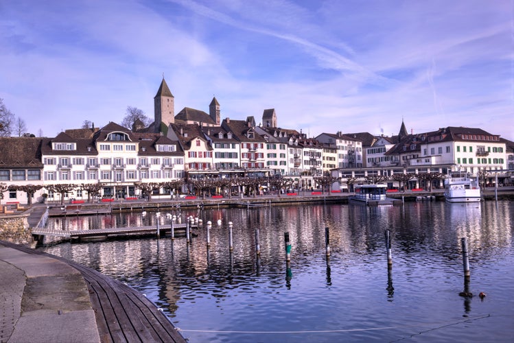 photo of view of Row of houses and building in the Rapperswil-Jona marina and second the most important port of Lake Zurich. Photo taken in 3rd of January 2020 in Rapperswil-Jona, St. Gallen canton, Switzerland.