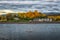 Photo of Kenmare Bay with residential houses in the distant background at Kenmare, County Kerry, Ireland.