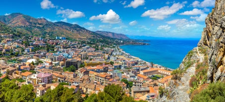 Photo of view of Cefalu and Promontorio de Torre Caldura seen from Norman Castle, La Rocca park, Italy.