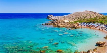 Photo of aerial view of seaside village of Archangelos in Laconia, Greece.