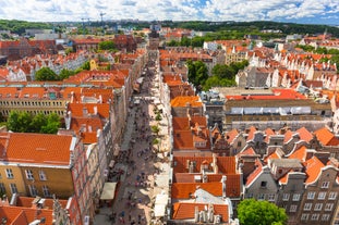 Photo of aerial view of Torun old town with Vistula river, Poland.