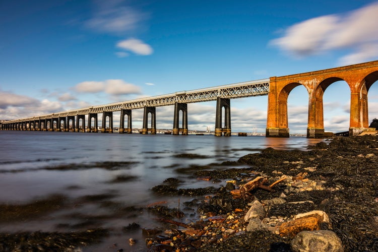 photo of view of tay rail bridge on the firth of tay river, Dundee, Scotland.