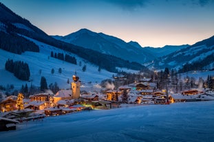 Photo of aerial view over Saalbach village in summer, Austria.