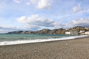 Photo of an aerial view of a mediterranean spanish beach (San Cristobal beach) at Almunecar, Granada, Spain.