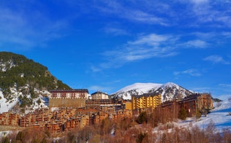 photo of Mountains in Androrra and ski cable car over the valley of Soldeu - Pas de la Casa.