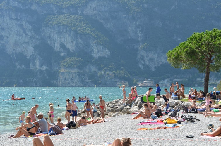 Riva Del Garda Trento  People who bath and sun bathe in the lake