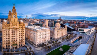 Aerial drone view of Manchester city in UK on a beautiful sunny day.