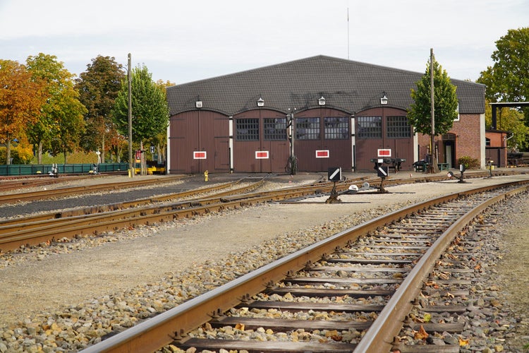 Photo of Train station Bruchhausen Vilsen, district of Diepholz, Lower Saxony, Germany. An old locomotive shed for steam locomotives at the station. 