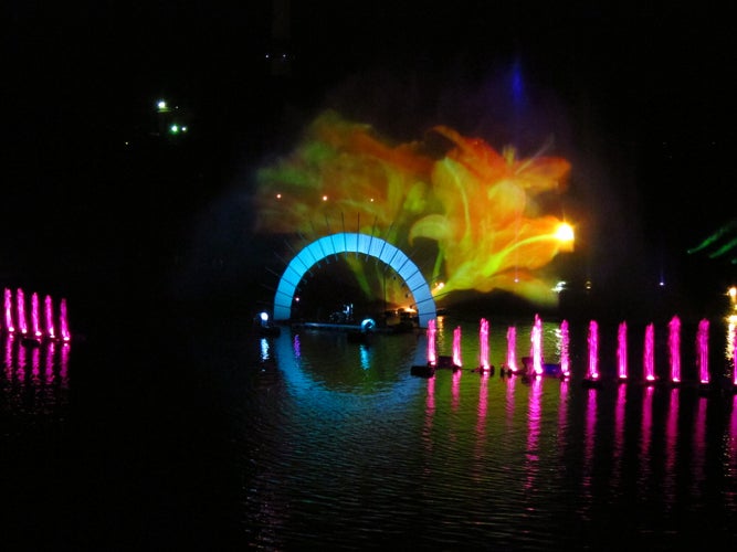 Dancing musical fountain in sea festival at night Klaipeda city Lithuania country