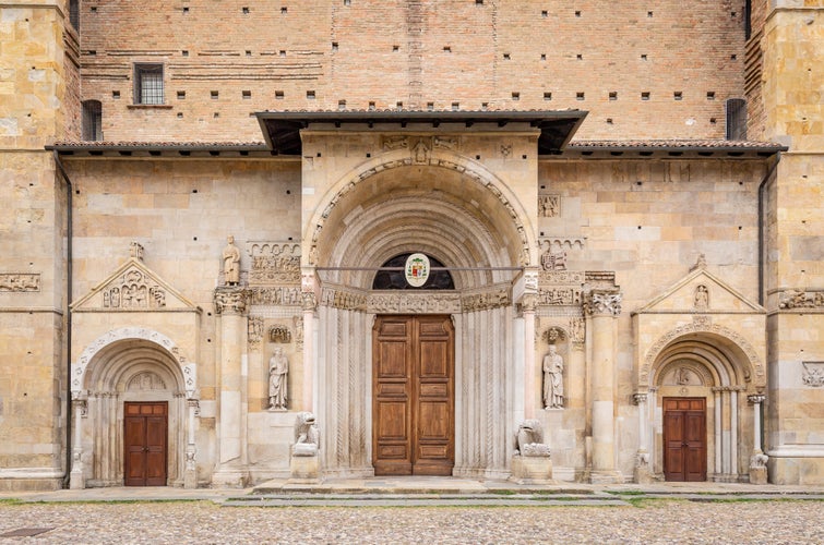 Photo of Romanesque portal of the Fidenza Cathedral, province of Parma, region of Emilia Romagna, Italy.