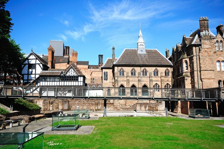 photo of buildings within St Mary Priory Gardens with the Cathedral West Wall ruins at the bottom, Coventry, West Midlands, England, UK, Western Europe.