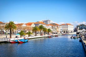 Porto, Portugal old town ribeira aerial promenade view with colorful houses, Douro river and boats.