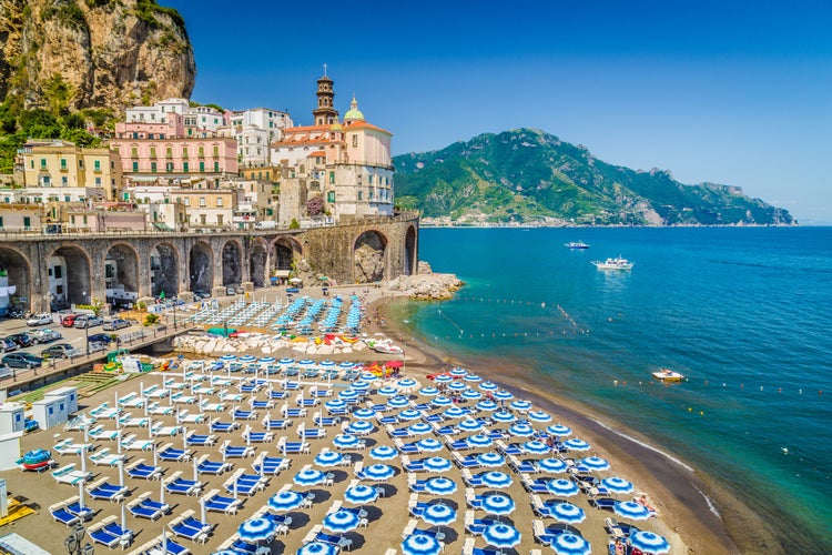 Photo of scenic picture-postcard view of the beautiful town of Atrani at famous Amalfi Coast with Gulf of Salerno, Campania, Italy.