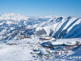 Photo of aerial view over Saalbach village in summer, Austria.