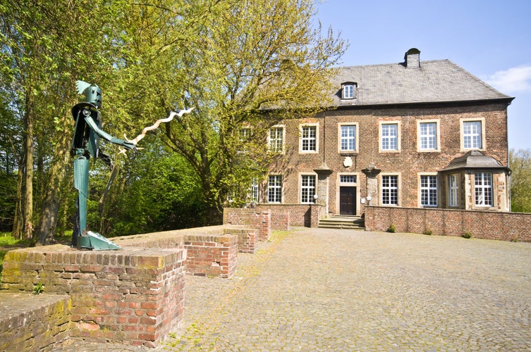 Photo of Castle Vondern in Oberhausen on a sunny day, Germany.