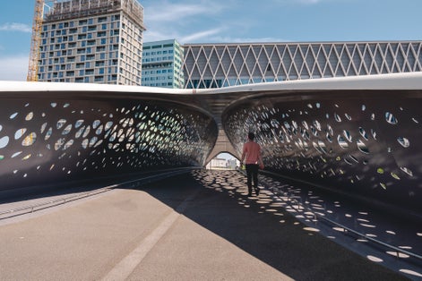 Parkbrug Antwerpen in Belgium. Cyclists can easily go from Park Spoor Noord to Het Eilandje via the Park Bridge and vice versa.