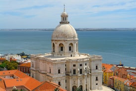 Photo of Lisbon City Skyline with Sao Jorge Castle and the Tagus River, Portugal.