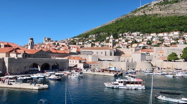 Photo of panoramic aerial view of the old town of Dubrovnik, Croatia seen from Bosanka viewpoint on the shores of the Adriatic Sea in the Mediterranean Sea.