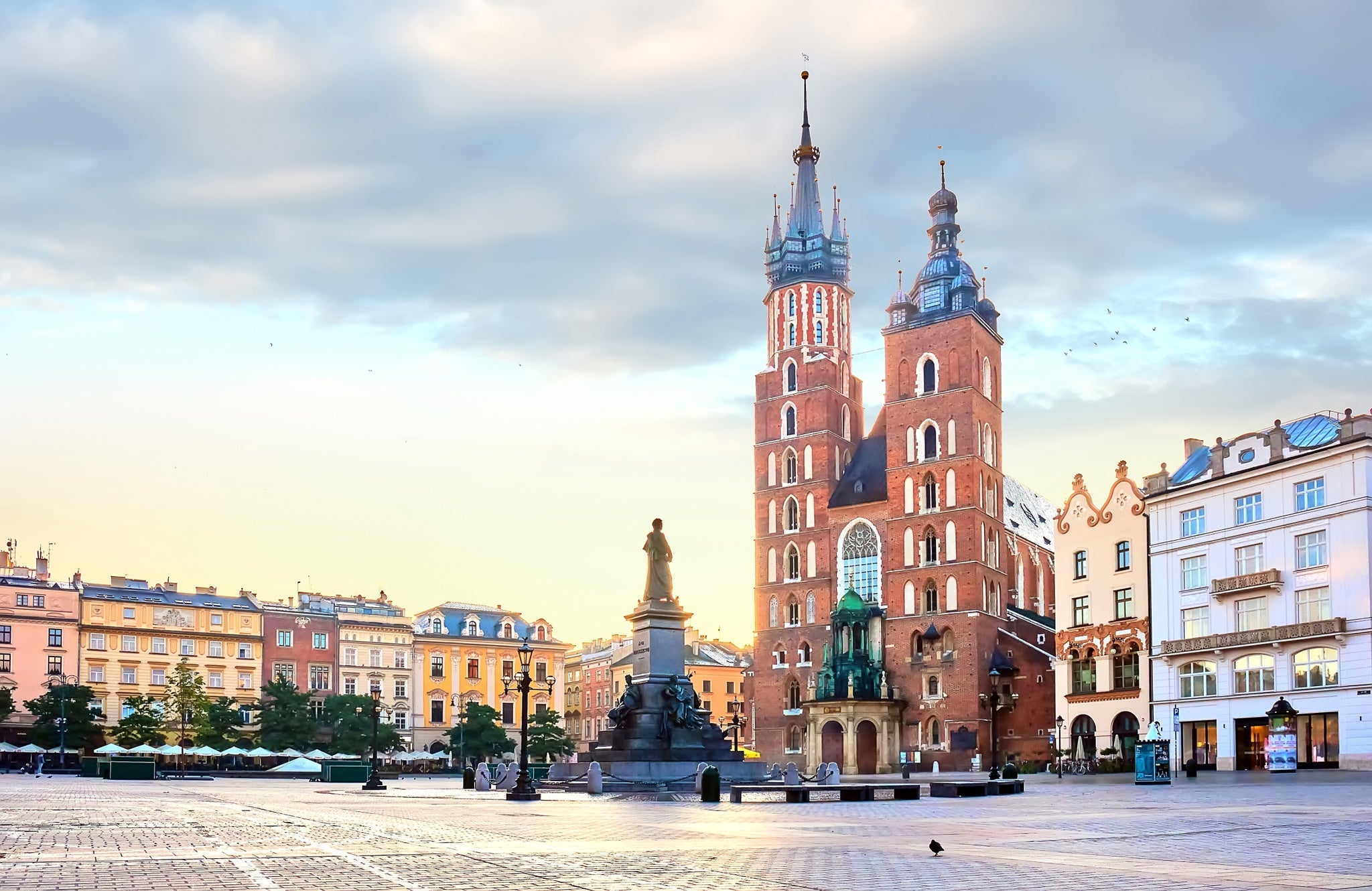 Mariacki Cathedral at Market square in Krakow at the center of old town at sunrise, Poland.jpg