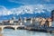 Photo of morning cityscape view with mountains, river and bridge in Grenoble city on the south-east of France.