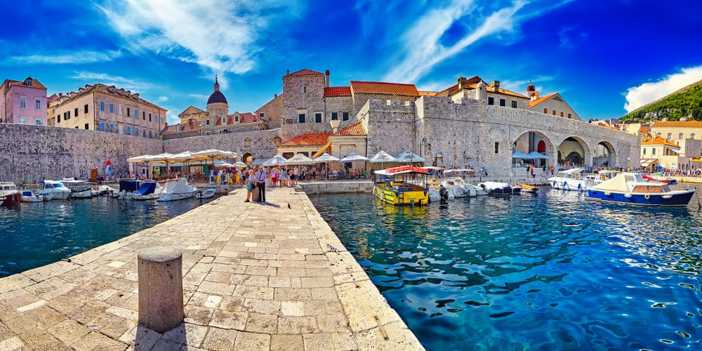 Photo of the Amazing panorama Dubrovnik Old Town roofs at sunset.