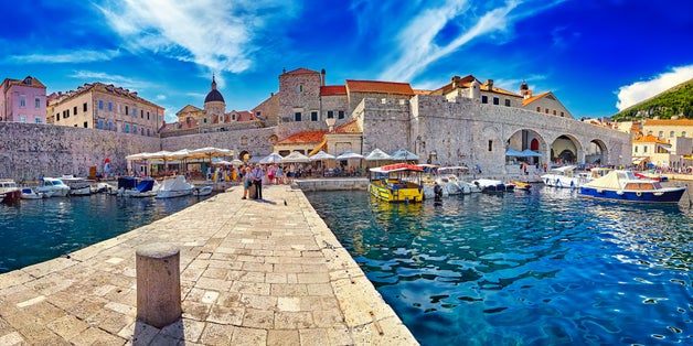 Photo of the Amazing panorama Dubrovnik Old Town roofs at sunset.