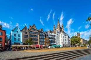 Photo of beautiful postcard view of the famous historic town of Rothenburg ob der Tauber on a sunny day with blue sky and clouds in summer, Franconia, Bavaria, Germany.