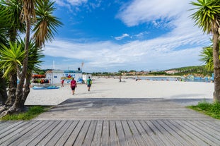 Photo of aerial view of an empty beach in Portonovo in the Ria de Pontevedra, Spain.