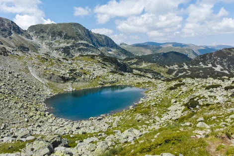 photo of view of Lake at the trail from Malyovitsa hut to Scary (strashnoto) Lake, Rila Mountain, Bulgaria,Kyustendil bulgaria.