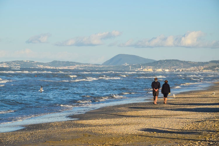 The beach of Senigallia, in the Marche region of Italy, deserted during a windy day. In the distance you can see Mount Conero