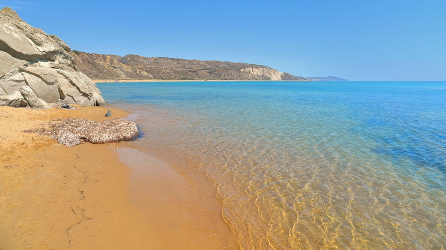 Photo of beautiful seascape with clear turquoise water on the beach Torre Salsa, Siculiana, Agrigento Sicily, Italy.