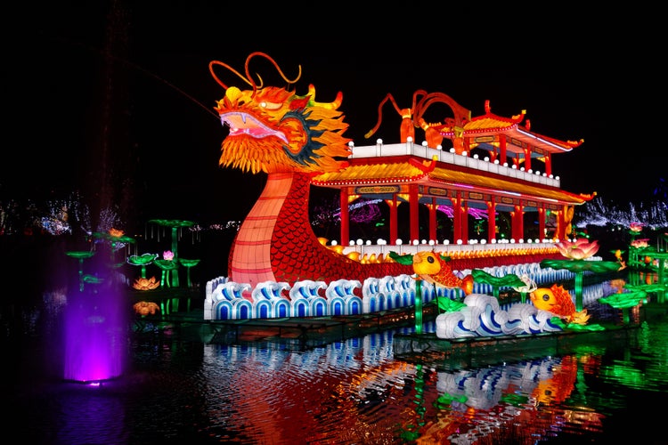 photo of view of The Festival des Lanternes in Blagnac - Orange dragon boat.