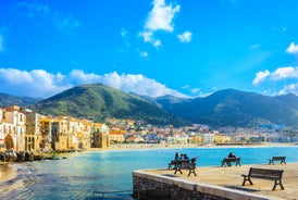 Photo of view of Cefalu and Promontorio de Torre Caldura seen from Norman Castle, La Rocca park, Italy.