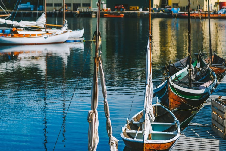 photo of view of Closeup view of boat in the Kristiansund port, on the fjord coast, located in the Norwegian archipelago