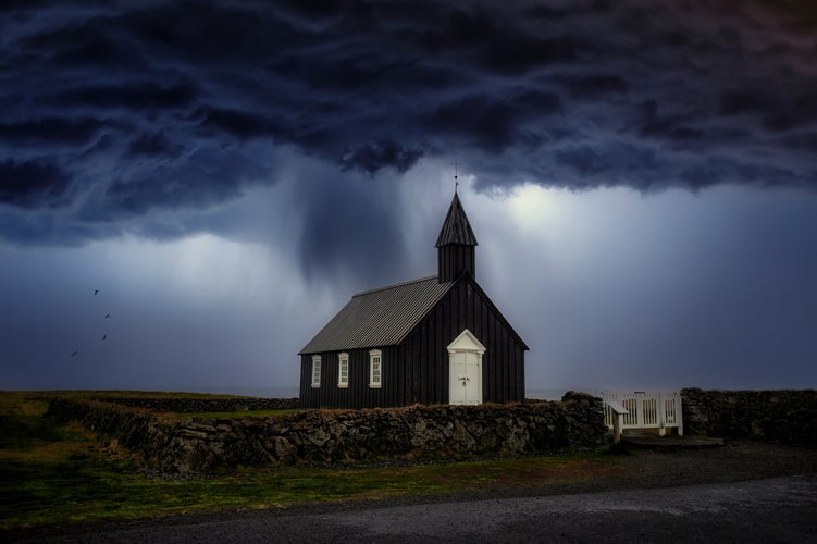 photo of view of The church is located on the southern side of the Snaefellsness peninsula. Iceland.