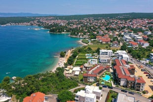 Photo of aerial view of Historic Adriatic town of Krk aerial view, Island of Krk, Kvarner bay of Croatia.