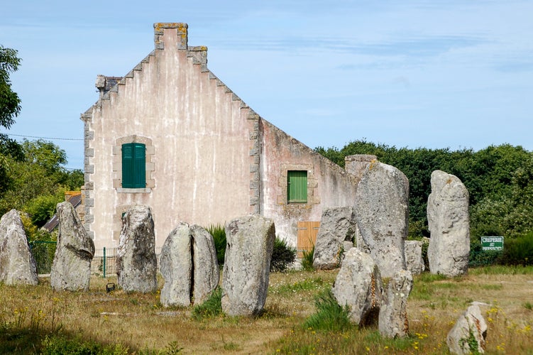 Photo of Derelict house among the Carnac standing stones megalithic in Brittany France