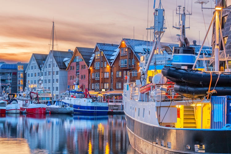 Tromso harbour at sunset, Norway.