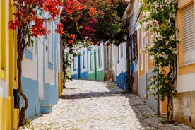 Photo of Carvoeiro fishing village with beautiful beach and colourful houses, Portugal.