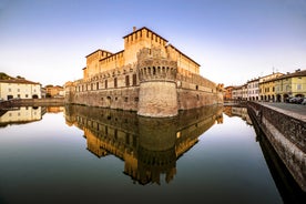 Photo of panorama of Parma cathedral with Baptistery leaning tower on the central square in Parma town in Italy.