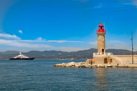 Photo of beautiful aerial view of Saint-Tropez, France with seascape and blue sky.